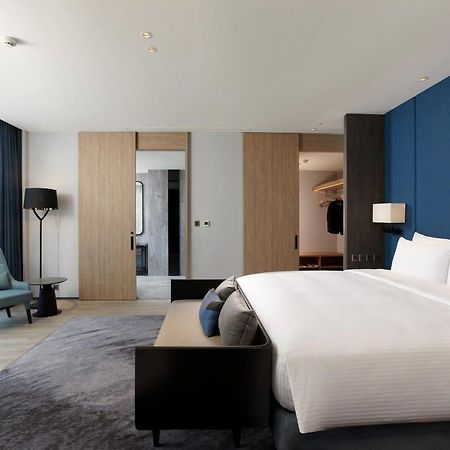 Hotel Cozzi Blu Zhongli Exterior foto A bedroom at the hotel